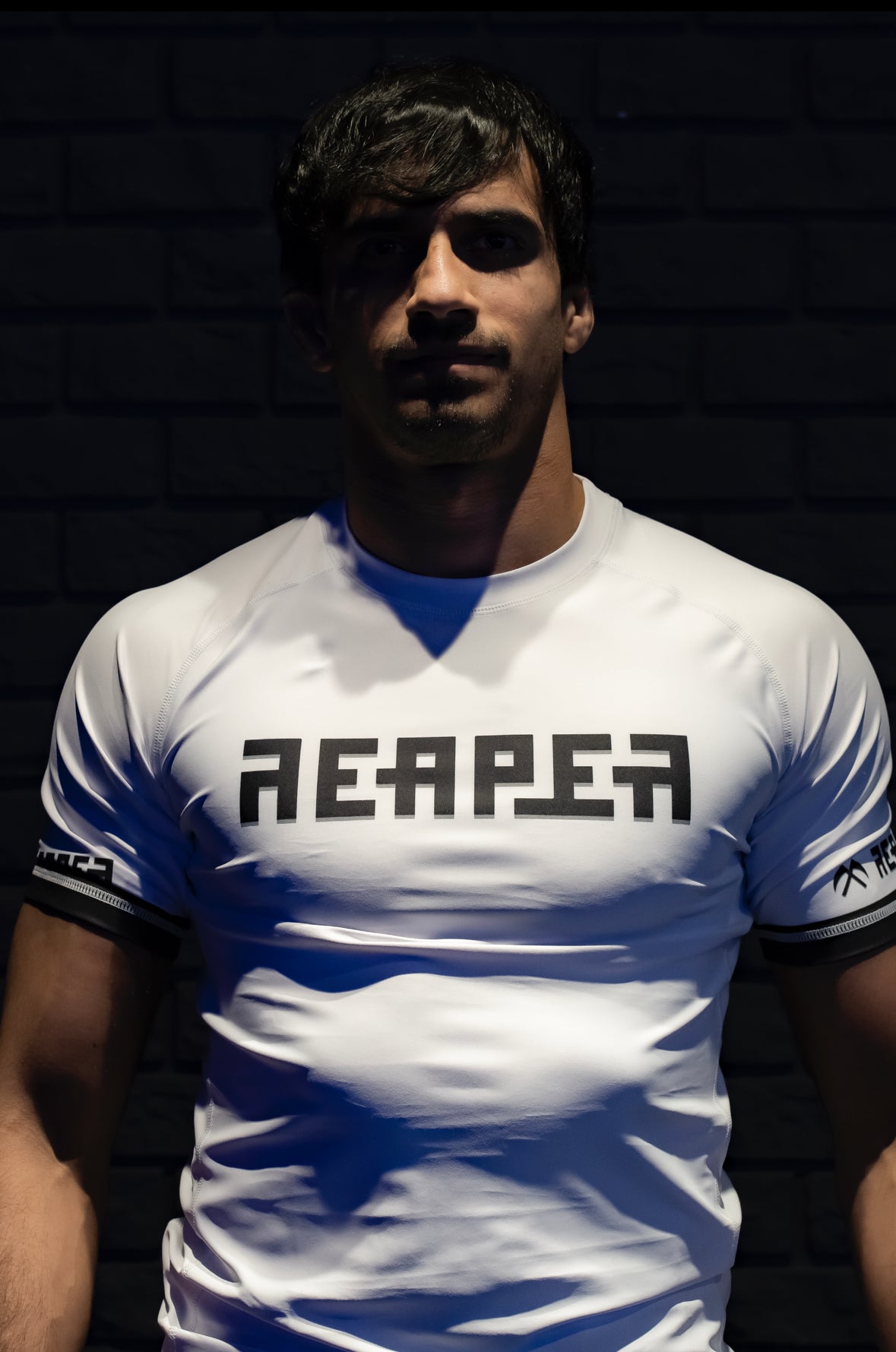 حصادة بيضاء المرتبة Rashguard